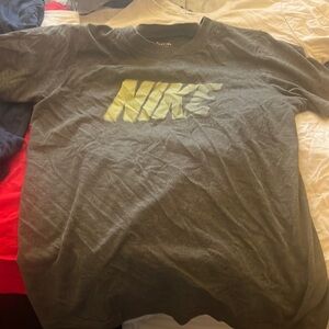Nike size medium tee used gray and green may have stains
